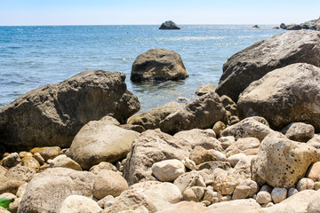 Fototapeta na wymiar Stones and the sea.