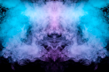 A multi-colored pattern of purple and blue smoke of a mystical shape in the form of a ghost's head or a strange creature on a black isolated background. Abstract pattern in of waves and steam.