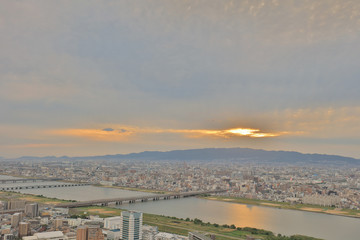  sunset sky over Osaka city business downtown