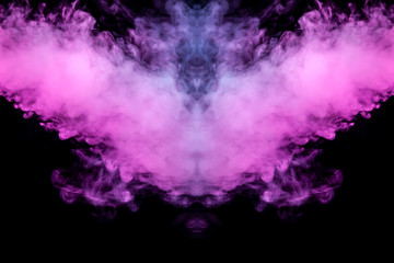 Abstract mystical bat silhouette straightened wings from streams of colorful smoke evaporating from a vape illuminated by neon lights on a black background.