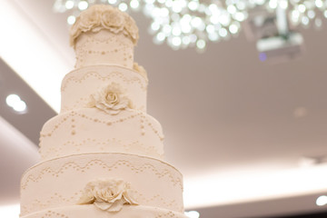 Elegant wedding cake and  .closed up blur background.