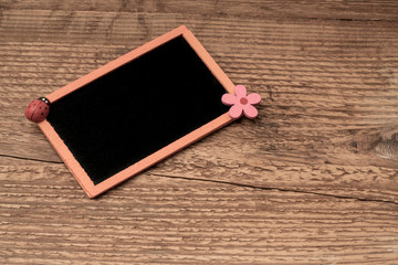 chalkboard on wooden surface with copy space