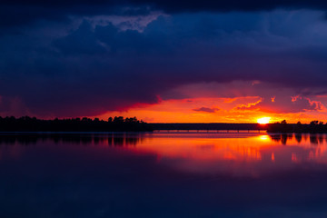 Naklejka na ściany i meble Sunset on the lake Saint lake.Shatura, Moscow region