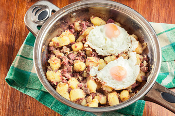 Corned beef hash in a frying pan