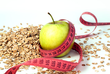 green apple, tailor meter and oatmeal