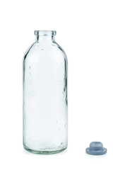 Empty transparent glass bottle isolated on white background