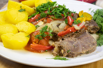 Potatoes, stewed meat with vegetables