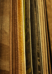 Sale! Assortment of different carpets in store. close up picture