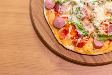 Delicious italian pizza served on wooden table