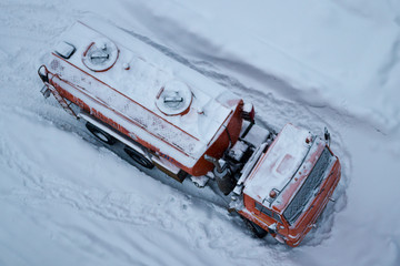 snow-covered tank truck for transporting gas and oil products
