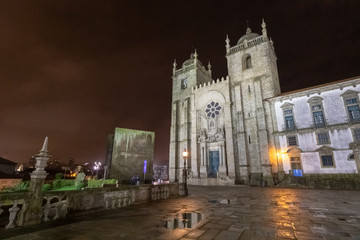 Fototapeta na wymiar Walking in rainy evening Porto. Beautiful Portugal Architecture.