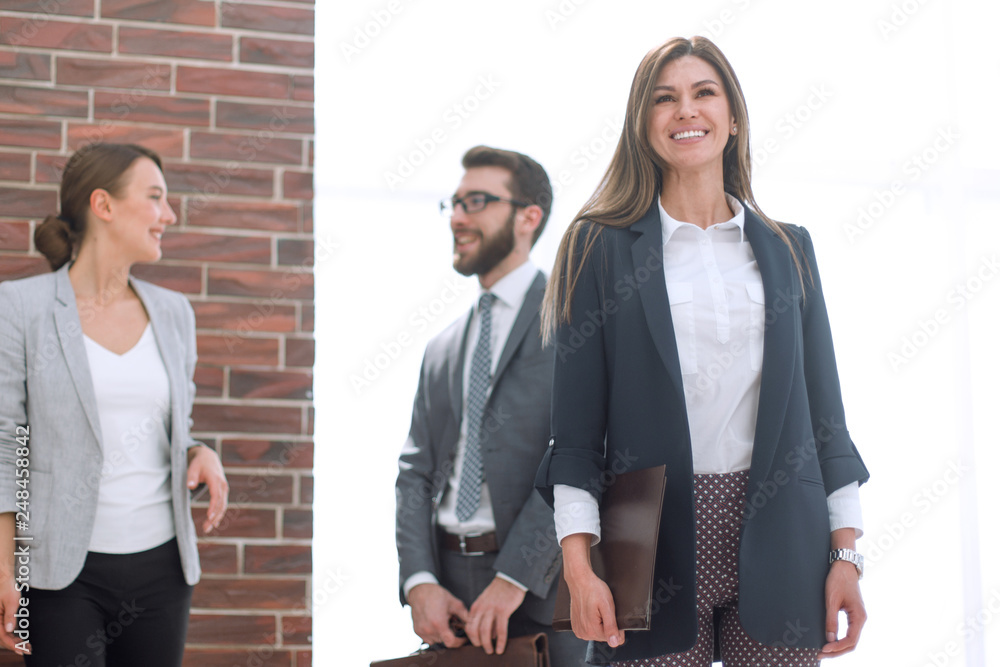 Sticker modern business woman standing in a spacious office