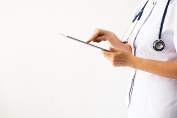  close up on hands nurse checking patient information on tablet