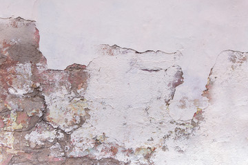 Fragment Of Surface Of Old Cement Wall With Remains Of Peeling Paint And Plaster.