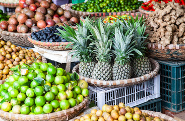 tropical spices and fruits sold at a local market in Hanoi (Vietnam)