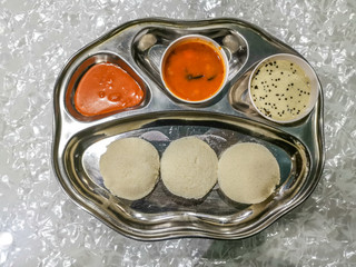 Masala Dosa and Idli Dosa food closeup with selective focus and crop fragment. It is a popular South Indian all time food