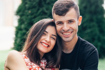 Fototapeta premium happy young couple in love on photoshoot in style of love story in the summer in nature