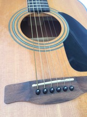 Obraz premium close up of an acoustic guitar