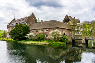 Fototapeta na wymiar Water Castle Wittringen Germany wit clouds