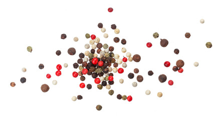 Heap of black, red, white and allspice peppercorns isolated on white background, top view