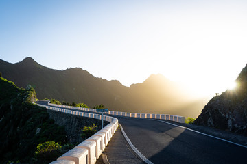 Fototapeta premium road to the mountains during sunrise