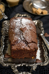 Homemade sweet cholocate cake with powdered sugar
