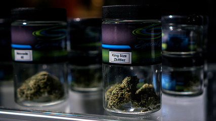 Eighth Ounce Jars Of Cannabis Flowers On Display