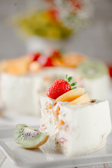 Strawberry, apricot and cream sponge cake. Cheesecake.