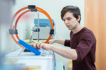 student conduct physical experiments at the university b