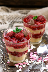 Fruit layered dessert in verrines with raspberries and French custard pastry cream