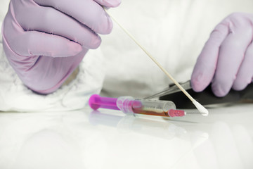 Unpacking of evidence - syringe with narcotics from place of crime