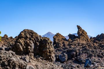 rocks in the mountains in front of teide mountain