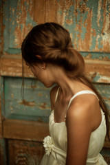 Fototapeta premium Photo of a teenager girl surrounded by countryside.