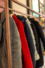 Obraz premium clothes hanger of different colors