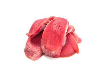 Veal pieces raw isolated on white background.