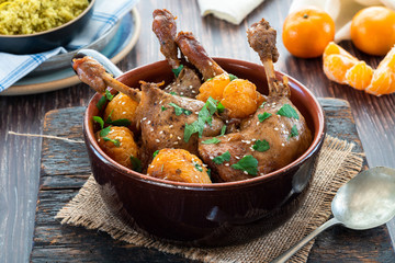 Duck tagine with clementines and citrus couscous