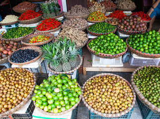 tropical spices and fruits sold at a local market in Hanoi (Vietnam)