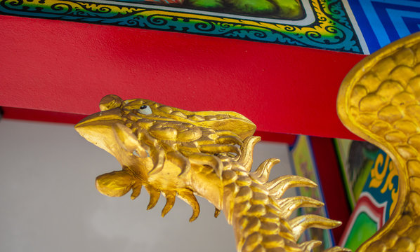 Chinese Dragon Head on temple background. decoration image contain certain grain and noise