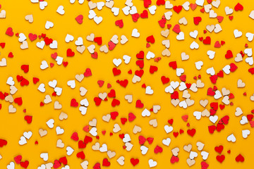 Happy Valentines day background. With small hearts on pastel background.