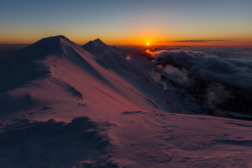 Fototapeta na wymiar sunset in snow mountains (Mt.Daisen, Tottori, Japan)