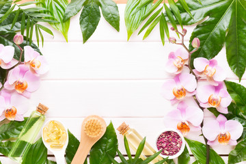 Beauty and fashion concept with spa set on pastel rustic wooden background.