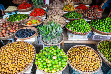 tropical spices and fruits sold at a local market in Hanoi (Vietnam)