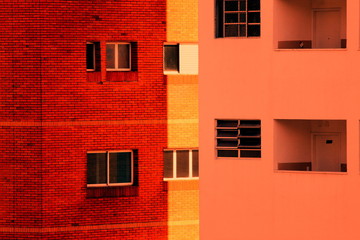 red brick wall with windows