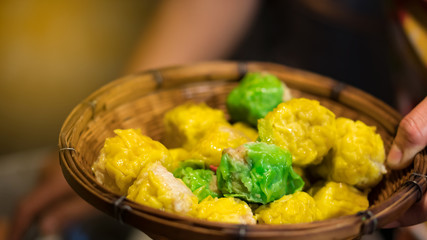 Dumpling Thai desserts in green, yellow