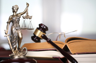 Law concept, sculpture and gavel  