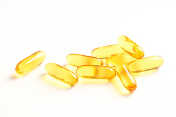 fish oil capsules isolated on white