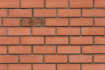 One old brick in the wall of a new red brick. Idiom. A fly in the ointment.