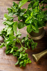 Mint in a mortar on the table