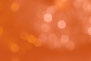 Abstract background of orange tones with bokeh