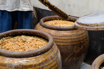 salted soybean paste in jar. soy miso production